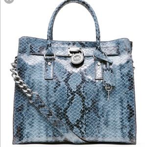 MK by Michael Kors satchel and matching wallet.